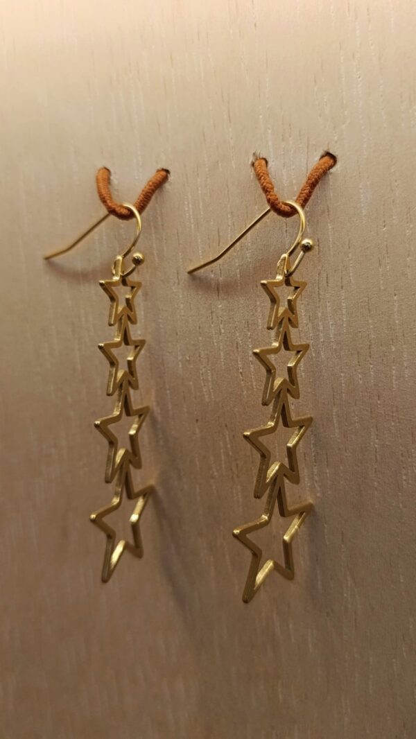 Pendientes estrellas en cascada dorados de acero inoxidable